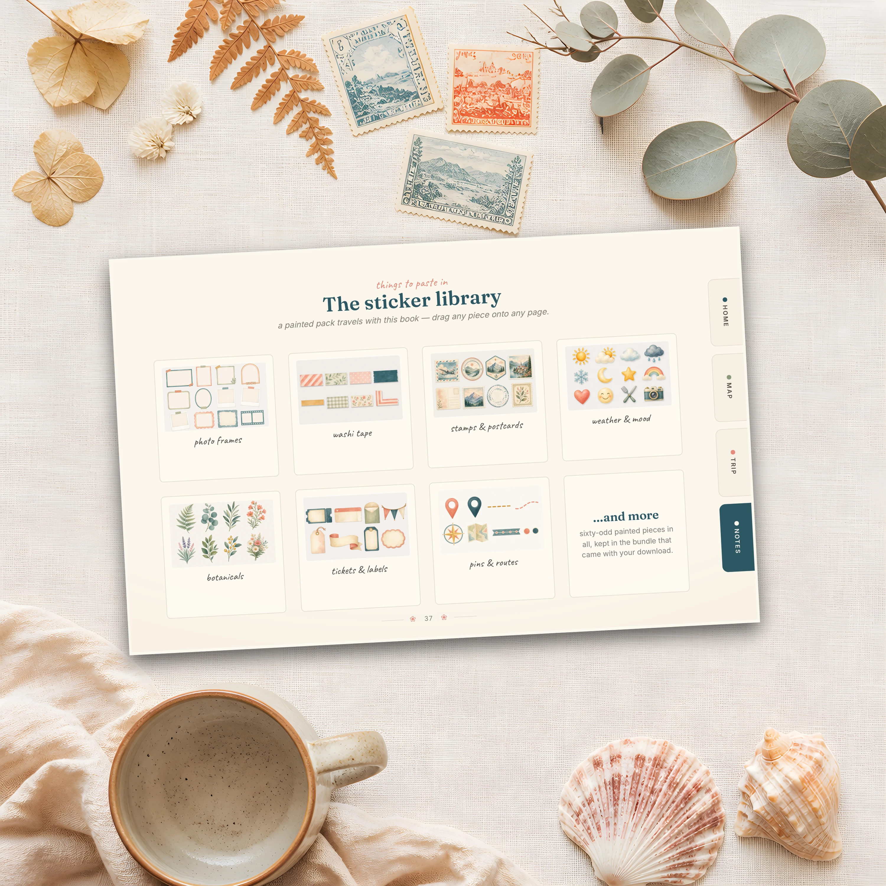 The sticker library page — painted washi, frames, stamps, and travel icons arranged in rows